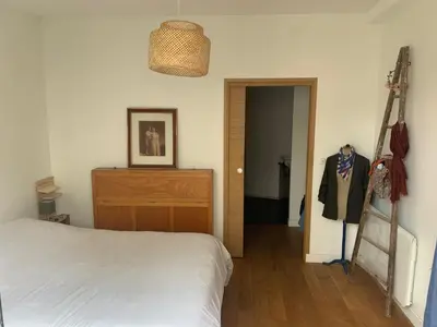 Un ou plusieurs lits dans un hébergement de l'établissement Maison avec terrasse
