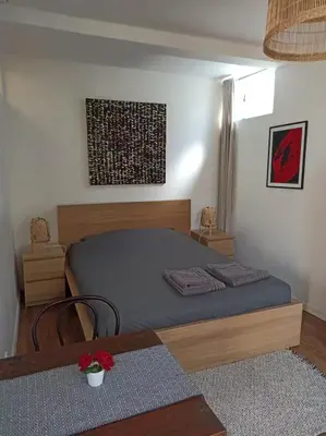Un ou plusieurs lits dans un hébergement de l'établissement Secret Garden Studio - Near Paris