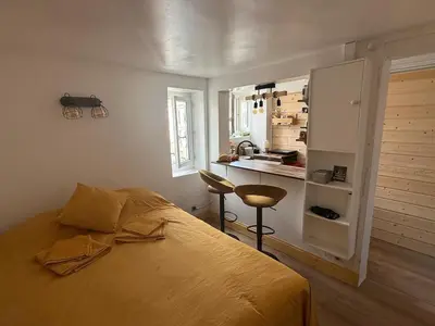 Un ou plusieurs lits dans un hébergement de l'établissement Appartement Paris 9
