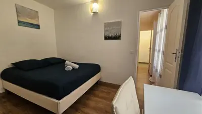 Un ou plusieurs lits dans un hébergement de l'établissement Bel Appartement en Plein Coeur de paris Quartier EMILY IN PARIS !