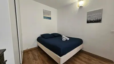 Un ou plusieurs lits dans un hébergement de l'établissement Bel Appartement en Plein Coeur de paris Quartier EMILY IN PARIS !