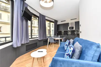 Coin salon dans l'établissement Chic apartment - 1BR 4P - near the Palais Garnier