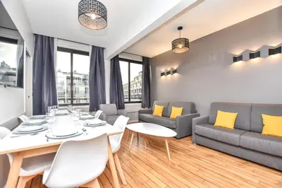 Coin salon dans l'établissement Authentic apartment - 2BR 8P - Palais Garnier