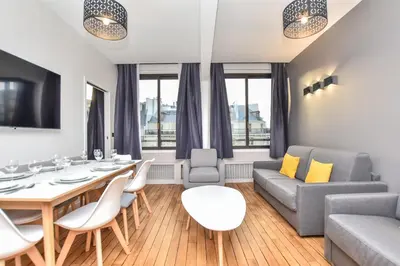 Coin salon dans l'établissement Authentic apartment - 2BR 8P - Palais Garnier