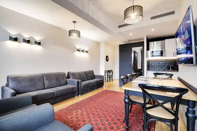 Coin salon dans l'établissement Modern apartment near Palais Garnier