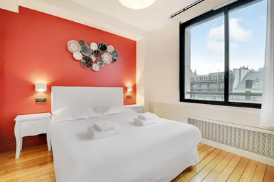 Un ou plusieurs lits dans un hébergement de l'établissement Modern apartment near Palais Garnier