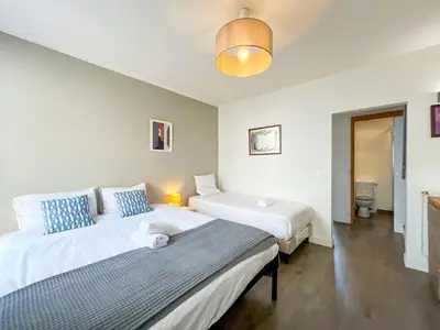 Un ou plusieurs lits dans un hébergement de l'établissement UrbanFlat 195 - Cosy Triplex in center of Paris