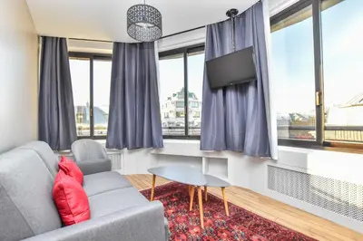 Coin salon dans l'établissement Stunning apartment - 1BR 4P - Opéra Garnier