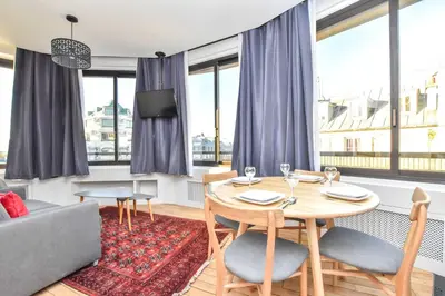Coin salon dans l'établissement Stunning apartment - 1BR 4P - Opéra Garnier