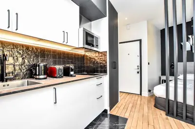 Cuisine ou kitchenette dans l'établissement Chic studio w jacuzzi - 2P - near Palais Garnier