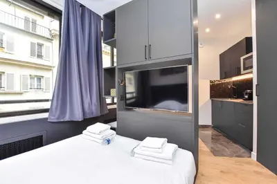 Un ou plusieurs lits dans un hébergement de l'établissement Magnificent studio - 2P - near Opéra Garnier