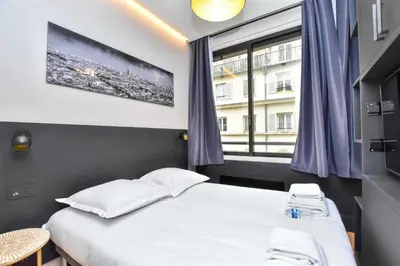 Un ou plusieurs lits dans un hébergement de l'établissement Magnificent studio - 2P - near Opéra Garnier
