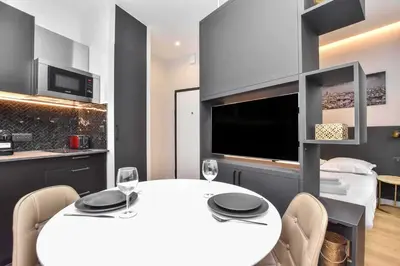 Cuisine ou kitchenette dans l'établissement Magnificent studio - 2P - near Opéra Garnier