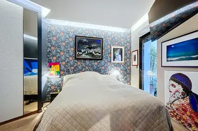 Un ou plusieurs lits dans un hébergement de l'établissement Maison avec rooftop Vue Tour Eiffel