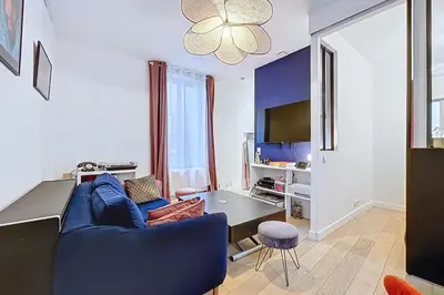 Télévision ou salle de divertissement dans l'établissement Charming pied-à-terre near Sacré Coeur