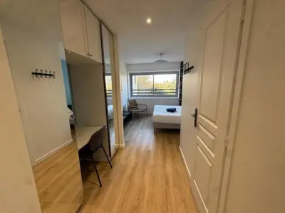 Un ou plusieurs lits dans un hébergement de l'établissement Residence Issy