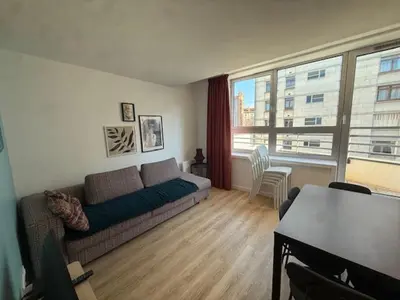 Coin salon dans l'établissement Residence Issy