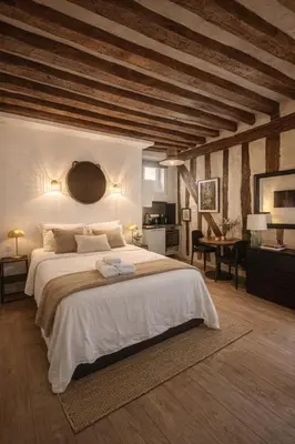 Un ou plusieurs lits dans un hébergement de l'établissement Sweet Home