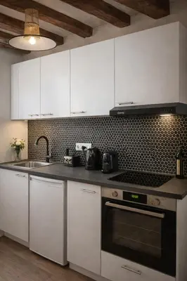 Cuisine ou kitchenette dans l'établissement Sweet Home