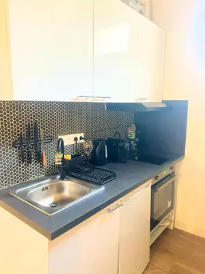 Cuisine ou kitchenette dans l'établissement Sweet Home