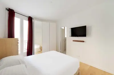Un ou plusieurs lits dans un hébergement de l'établissement Superb apt a c – 2BR 6P – St Germain-des-Prés