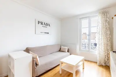Coin salon dans l'établissement GuestReady - Cosy flat near Arc de Triomphe