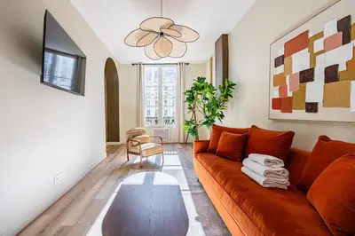 Coin salon dans l'établissement 22#Opera#GrandBoulevards#3Bedrooms#Paris 02#AC