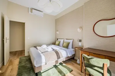 Un ou plusieurs lits dans un hébergement de l'établissement 22#Opera#GrandBoulevards#3Bedrooms#Paris 02#AC