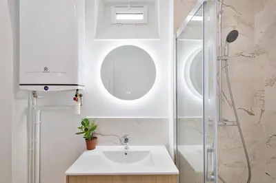 Salle de bains dans l'établissement 3P Cosy proche Paris La Défense Fondation LV