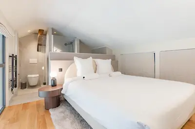 Un ou plusieurs lits dans un hébergement de l'établissement Superbe appartement climatisé - Bastille