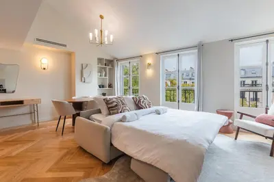 Un ou plusieurs lits dans un hébergement de l'établissement Superbe appartement climatisé - Bastille