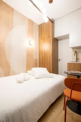 Un ou plusieurs lits dans un hébergement de l'établissement Elegant Studio Rive Gauche Duroc Bon Marche