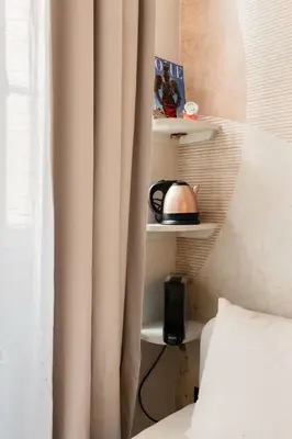 Un ou plusieurs lits dans un hébergement de l'établissement Elegant Studio Rive Gauche Duroc Bon Marche