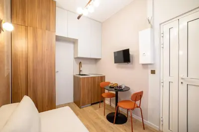 Télévision ou salle de divertissement dans l'établissement Elegant Studio Rive Gauche Duroc Bon Marche