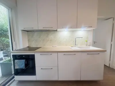 Cuisine ou kitchenette dans l'établissement Garden House The Arch