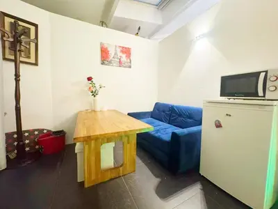 Télévision ou salle de divertissement dans l'établissement Cozy House Notre-Dame