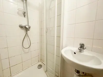 Salle de bains dans l'établissement Cozy House Notre-Dame