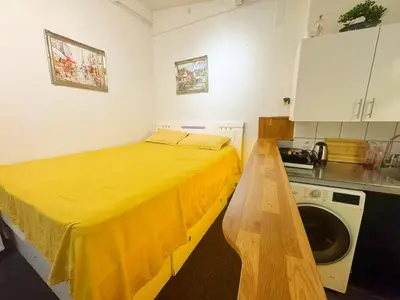 Cuisine ou kitchenette dans l'établissement Cozy House Notre-Dame