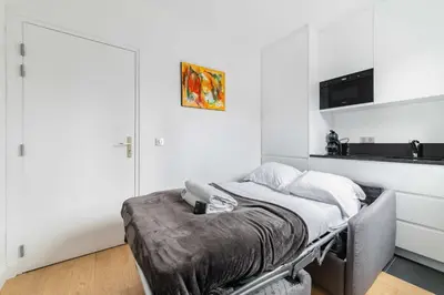 Un ou plusieurs lits dans un hébergement de l'établissement Studio cosy metro pereire paris 17 - 2P