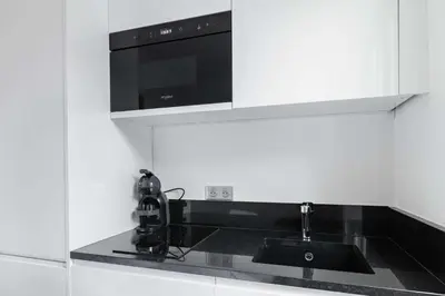 Cuisine ou kitchenette dans l'établissement Studio cosy metro pereire paris 17 - 2P