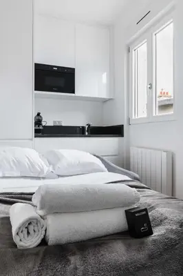 Un ou plusieurs lits dans un hébergement de l'établissement Studio cosy metro pereire paris 17 - 2P