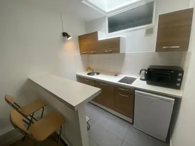 Cuisine ou kitchenette dans l'établissement Jolie 2 pieces metro voltaire - Paris 11 - 2P
