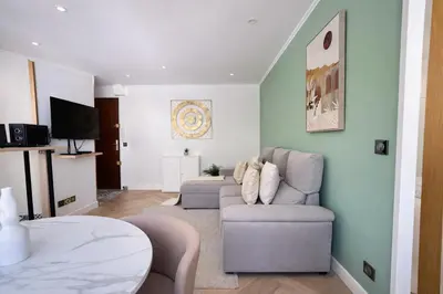 Coin salon dans l'établissement Appartement charmant au coeur du 16eme