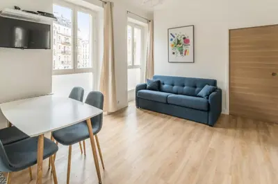 Coin salon dans l'établissement Appartement Montorgueil 3 étoiles - Welkeys