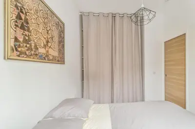 Un ou plusieurs lits dans un hébergement de l'établissement Appartement Montorgueil 3 étoiles - Welkeys