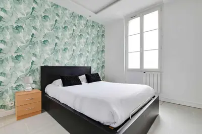 Un ou plusieurs lits dans un hébergement de l'établissement Appartement Paris 4 Proche Bastille Confort