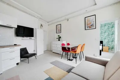 Télévision ou salle de divertissement dans l'établissement Appartement Paris 4 Proche Bastille Confort