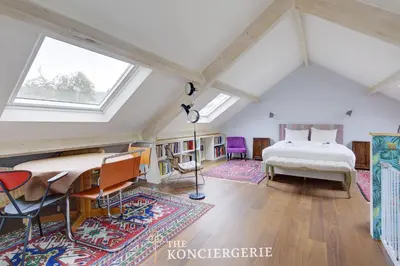 Un ou plusieurs lits dans un hébergement de l'établissement Duplex Cosy 3 pieces 14e