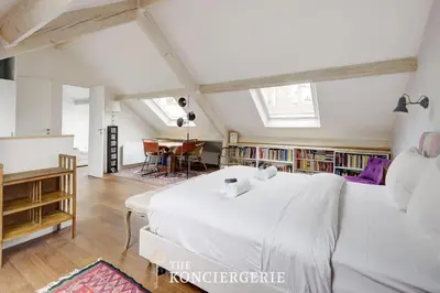 Un ou plusieurs lits dans un hébergement de l'établissement Duplex Cosy 3 pieces 14e