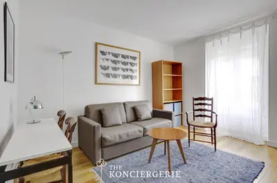 Coin salon dans l'établissement Duplex Cosy 3 pieces 14e